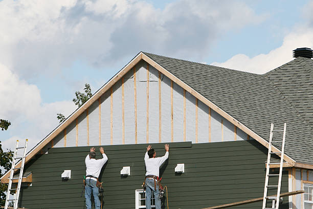 Professional Siding technician working in Grindstone, PA